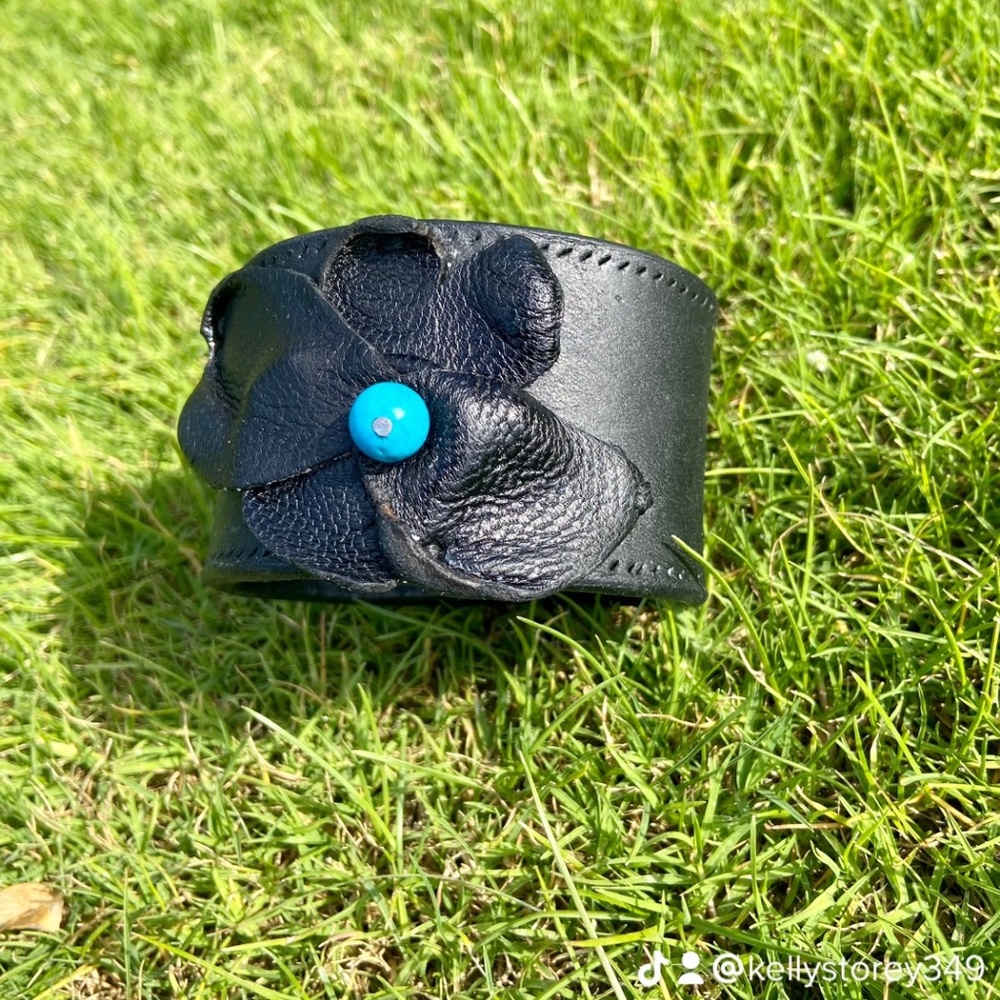 Handmade  fully lined black leather cuff( Made by me).